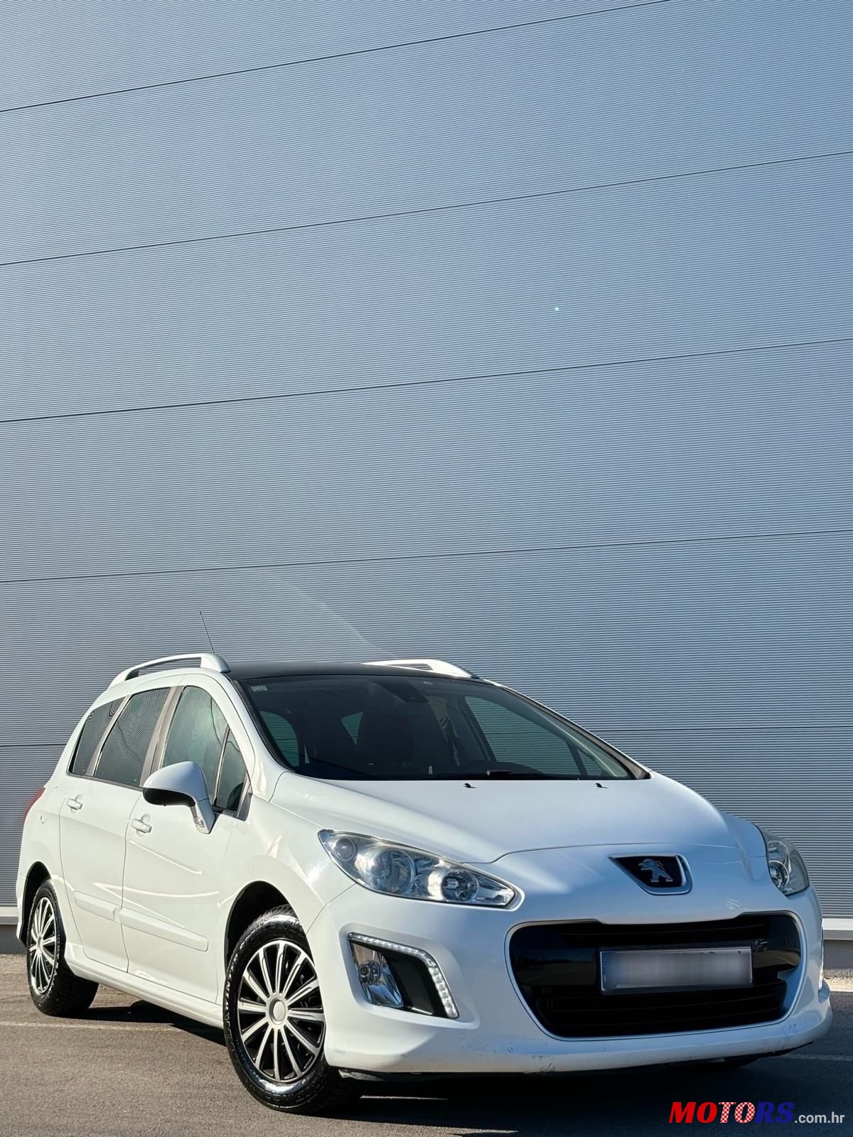 2013' Peugeot 308 Sw photo #3