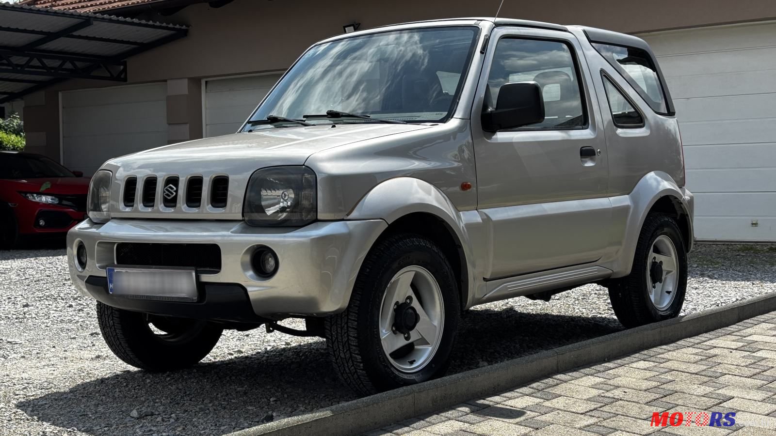 2004' Suzuki Jimny 1,3 Vx photo #1