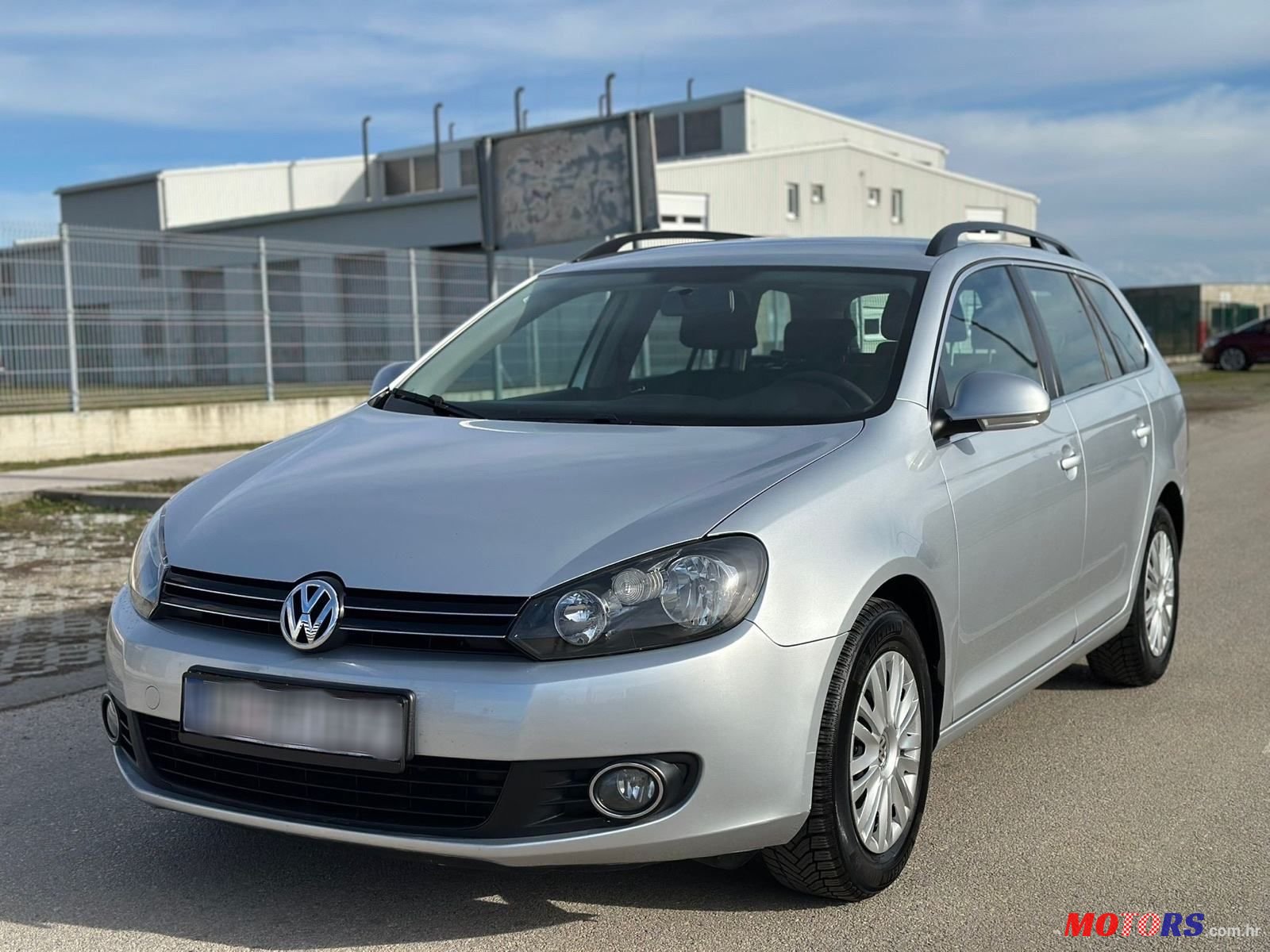 2011' Volkswagen Golf VI Variant photo #1