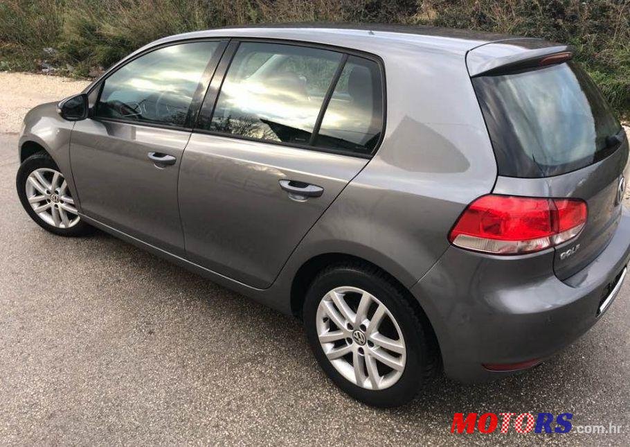 2011' Volkswagen Golf VI 1,6 Tdi photo #2