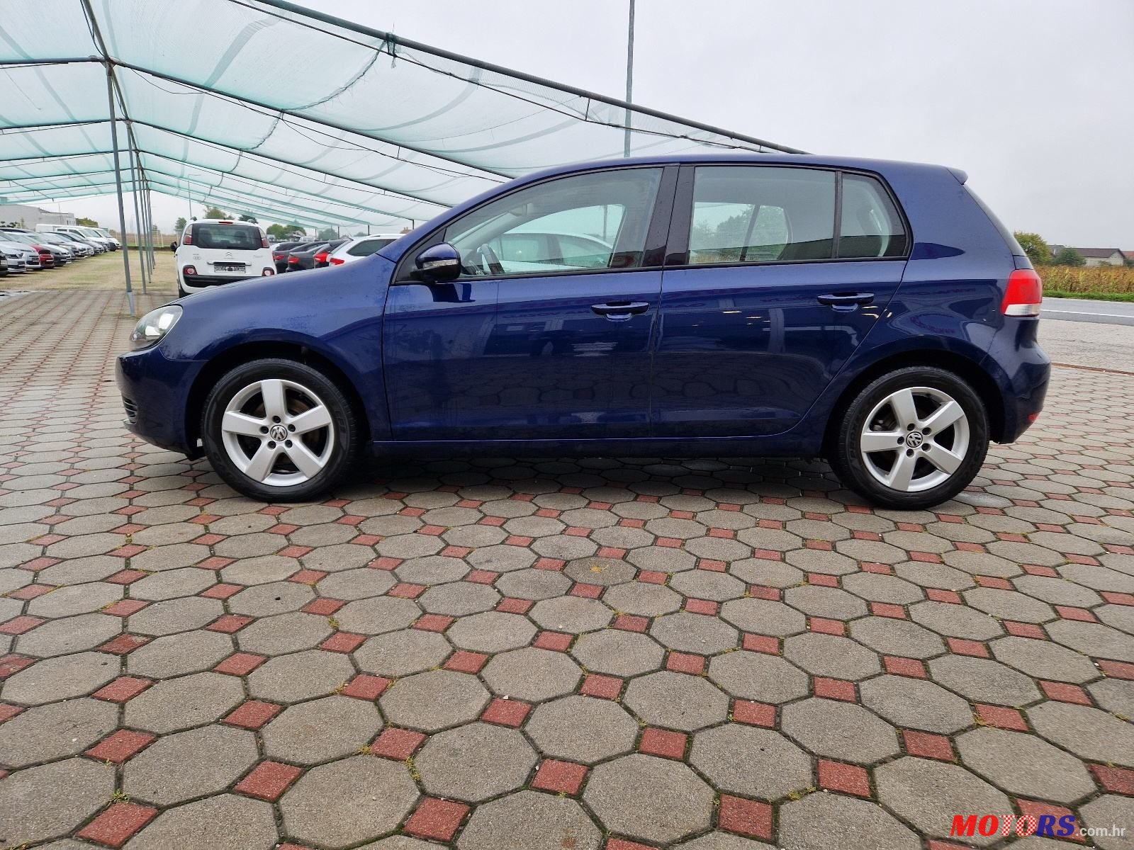 2009' Volkswagen Golf VI 1,6 Tdi photo #4