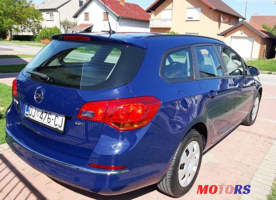 2014' Opel Astra Karavan 1,7 Cdti photo #1