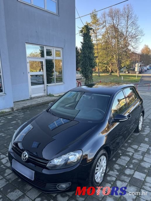 2011' Volkswagen Golf VI 1,6 Tdi photo #1