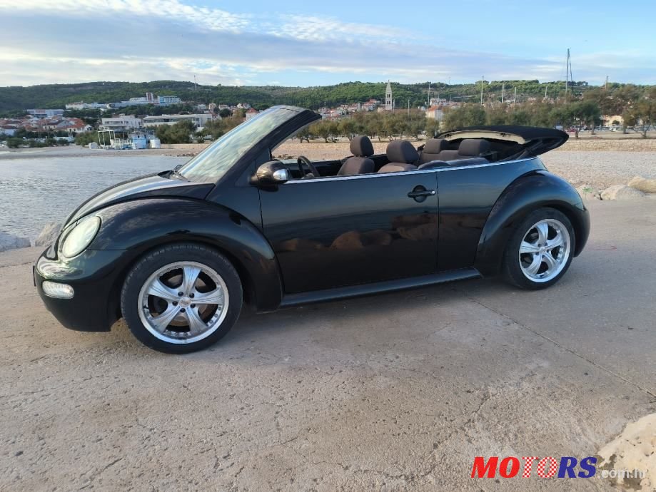 2004' Volkswagen Beetle 1,4 photo #5