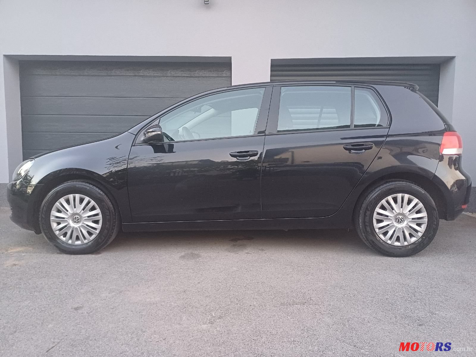 2009' Volkswagen Golf VI 1,6 Tdi photo #4