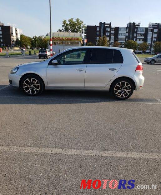 2009' Volkswagen Golf VI 1,6 Tdi photo #1