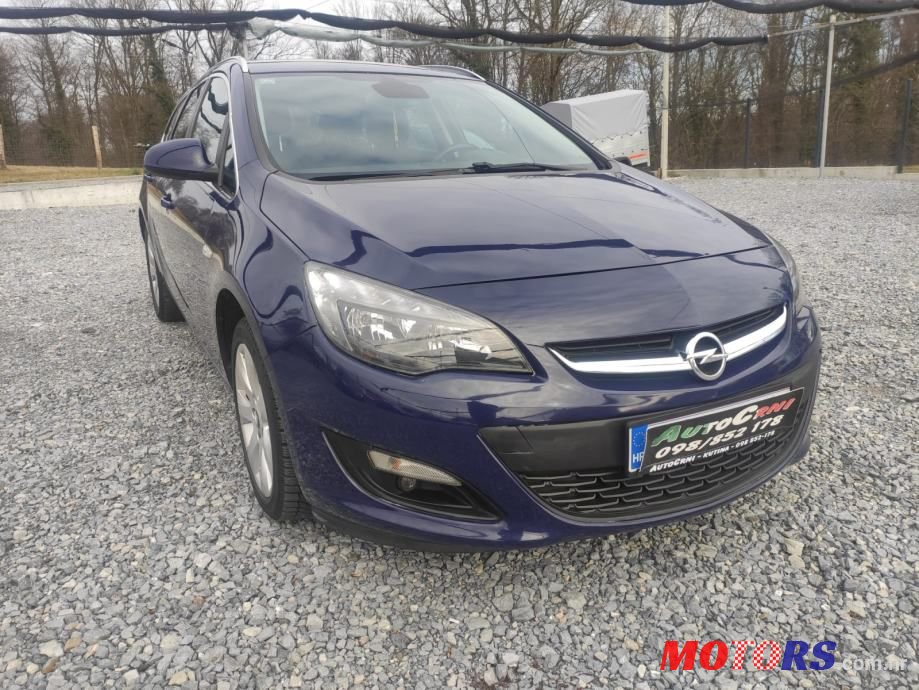 2015' Opel Astra Karavan photo #1