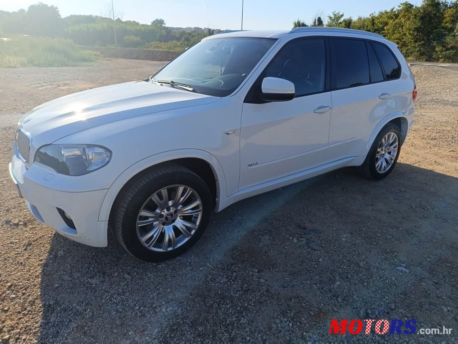 2009' BMW X5 Xdrive30D photo #1