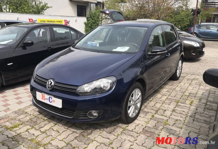 2012' Volkswagen Golf VI 1,6 Tdi photo #1