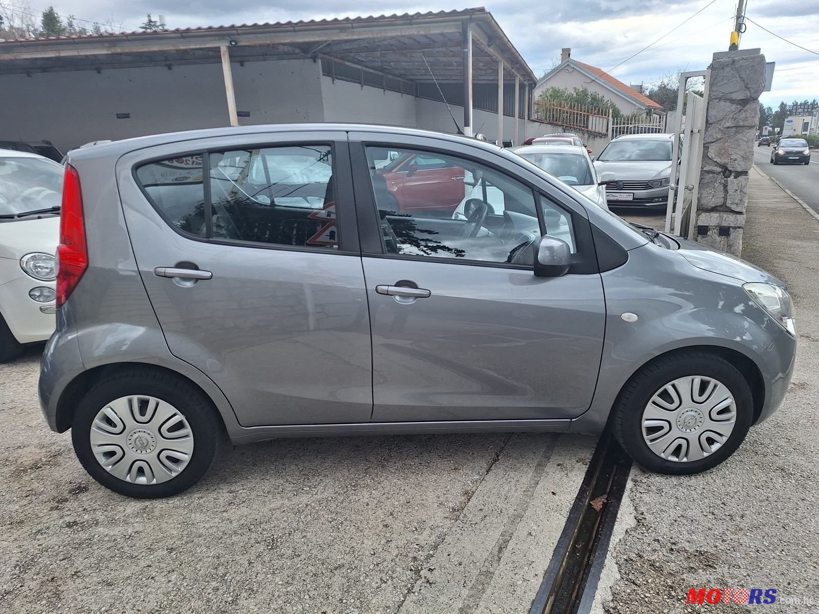 2014' Opel Agila 1.0 photo #6