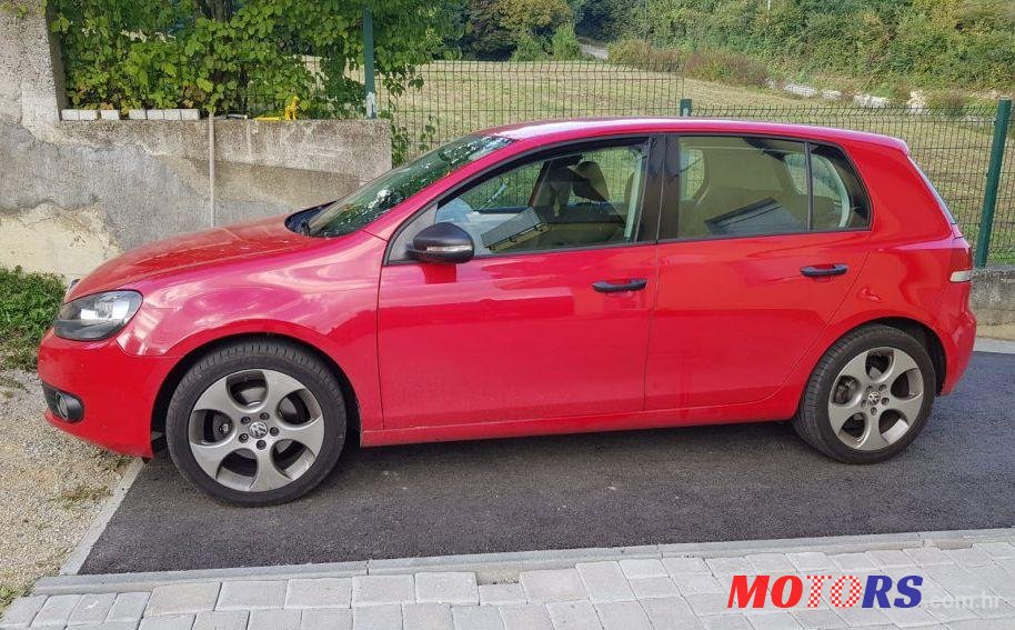 2011' Volkswagen Golf VI 1,6 Tdi photo #1