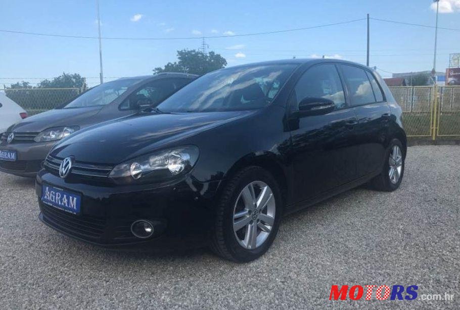 2012' Volkswagen Golf VI 1,6 Tdi photo #1