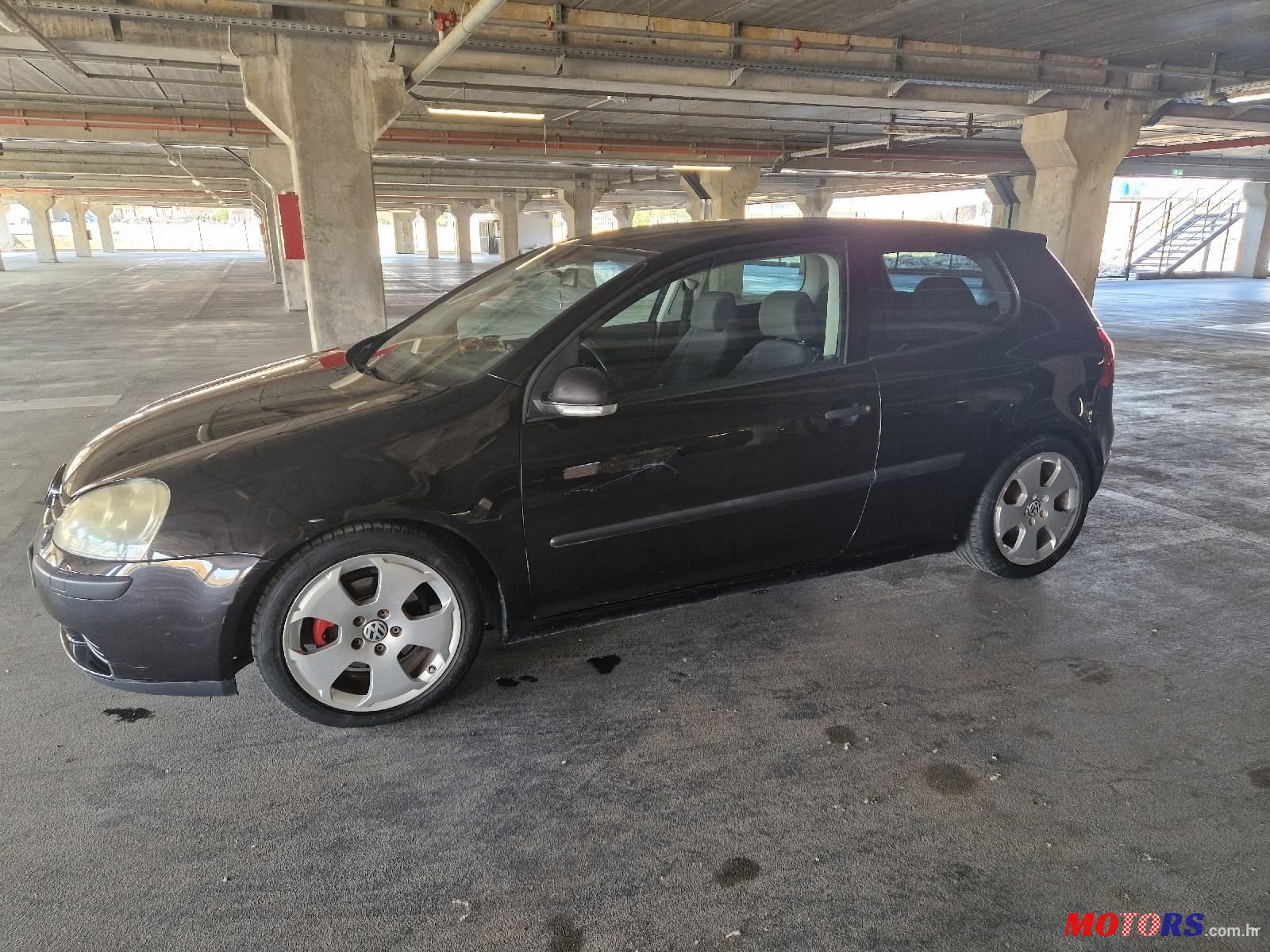 2004' Volkswagen Golf V 1,4 photo #1