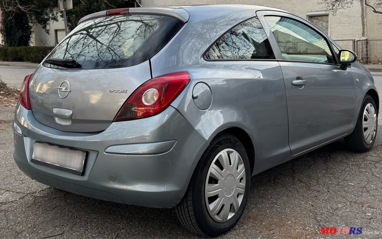 2009' Opel Corsa 1,0 12V photo #6