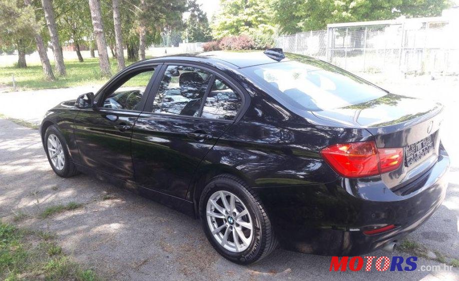 2014' BMW Serija 3 318D photo #2