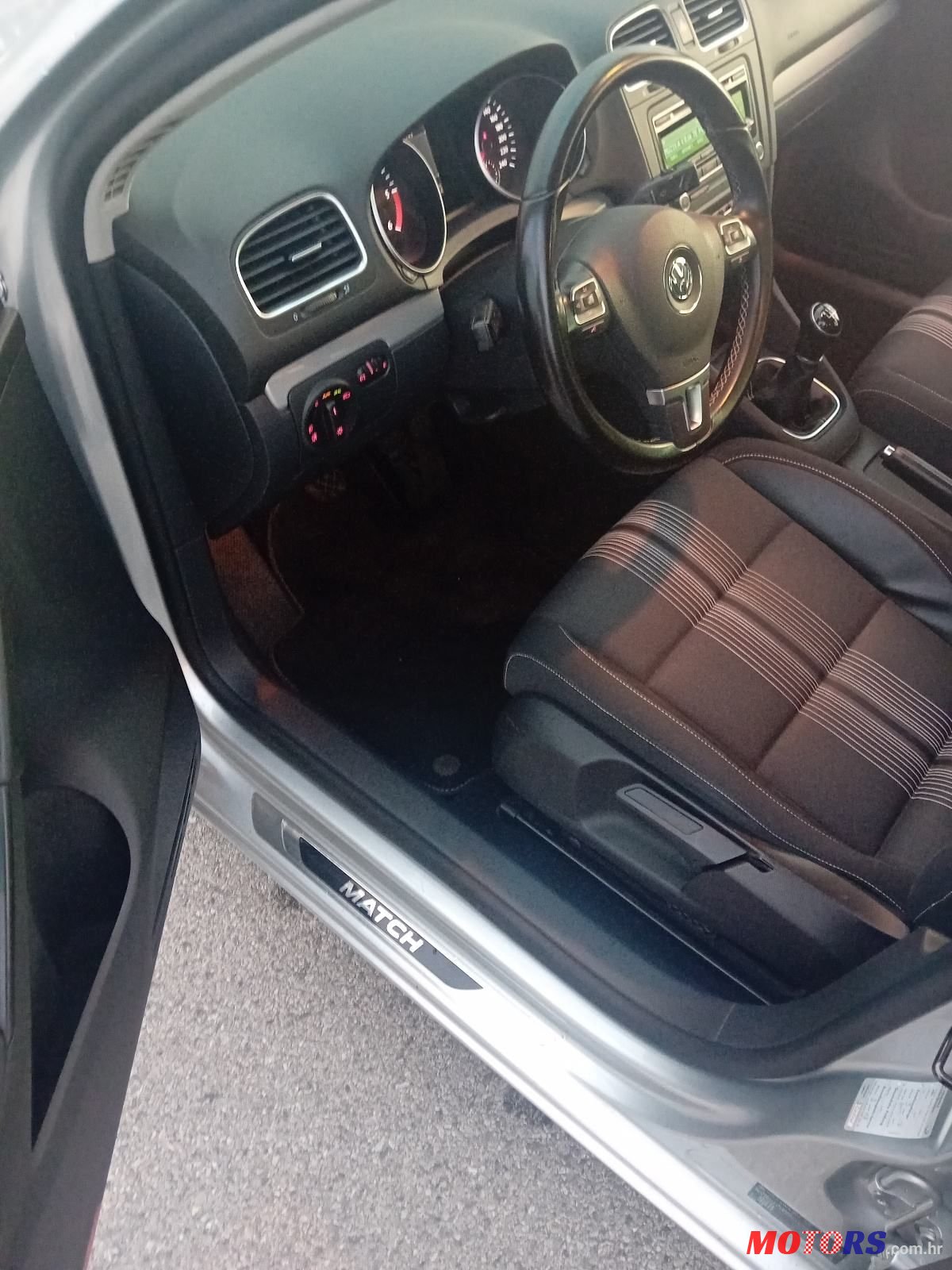 2012' Volkswagen Golf VI 1,6 Tdi photo #1