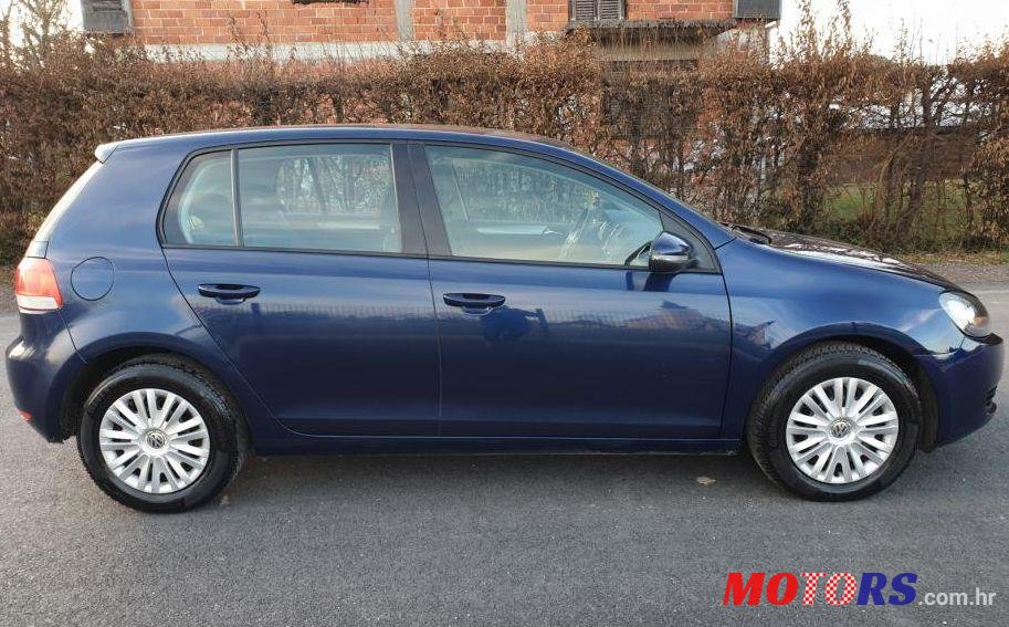 2009' Volkswagen Golf VI 1,6 Tdi photo #1