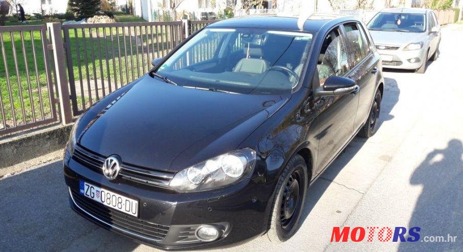 2010' Volkswagen Golf VI 1,6 Tdi photo #1