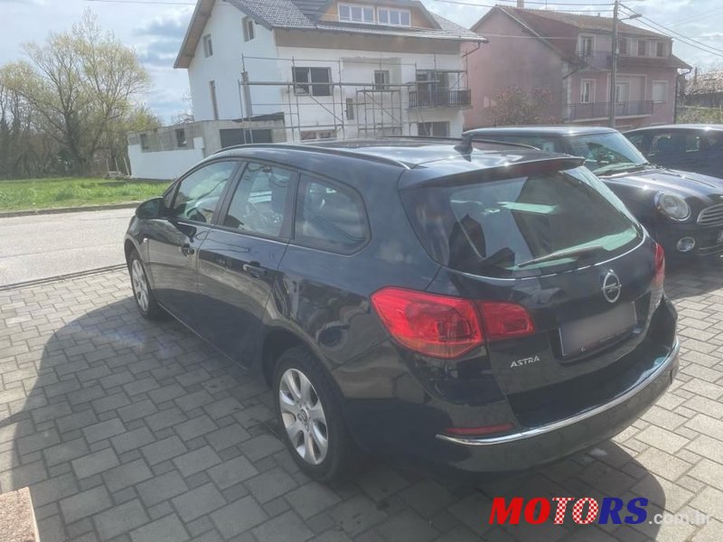 2015' Opel Astra Karavan photo #4