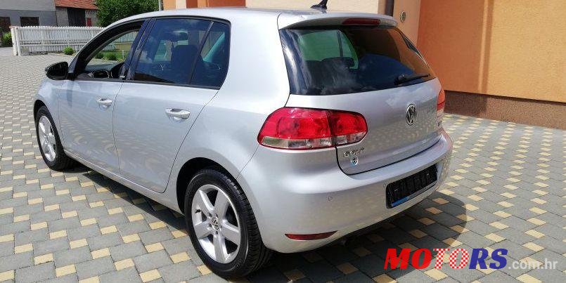 2012' Volkswagen Golf VI 1,6 Tdi photo #1