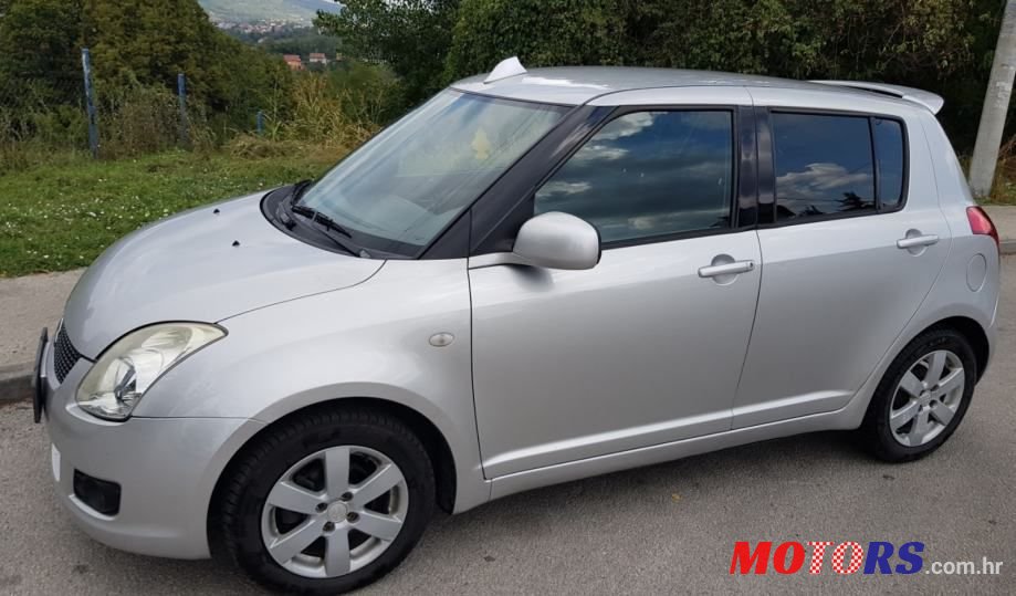 2009' Suzuki Swift 1,3 Glx photo #1