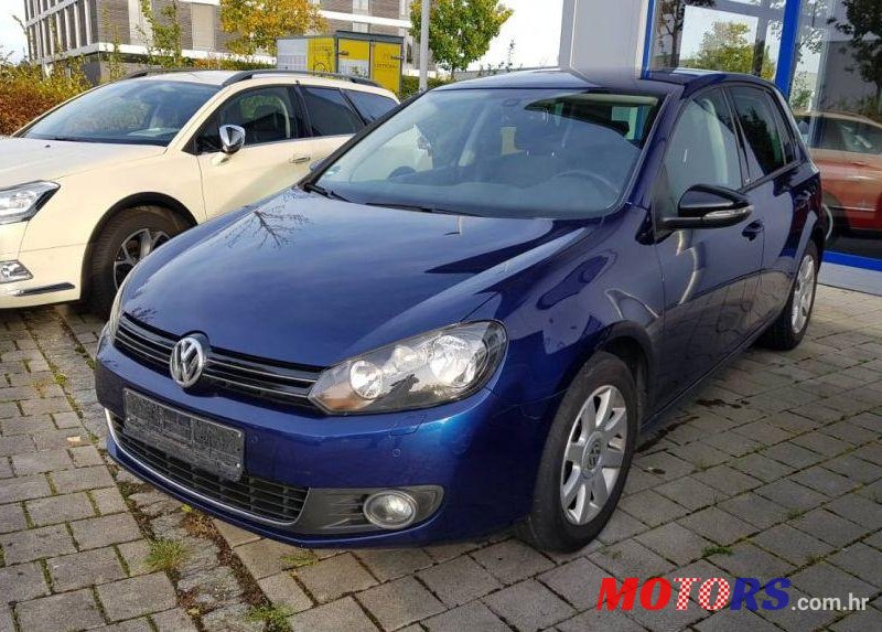 2012' Volkswagen Golf VI 1,6 Tdi photo #3