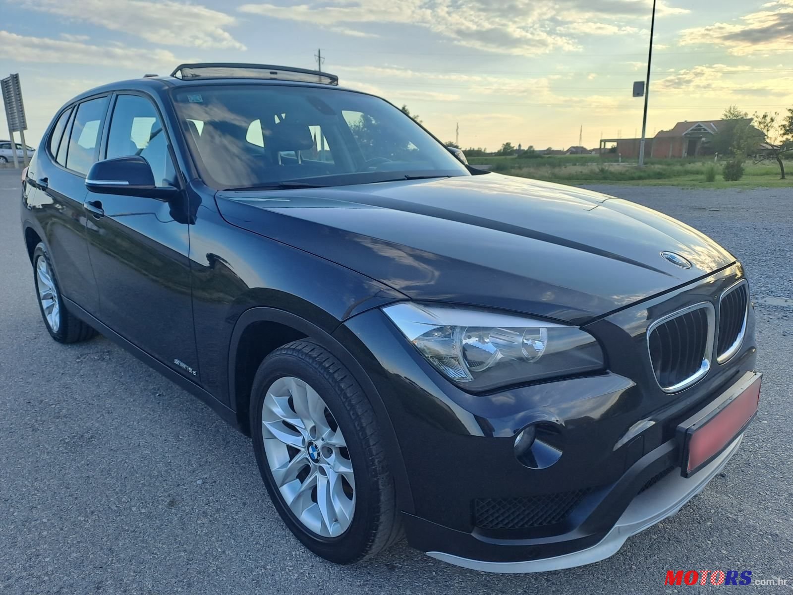 2014' BMW X1 Sdrive18D photo #3