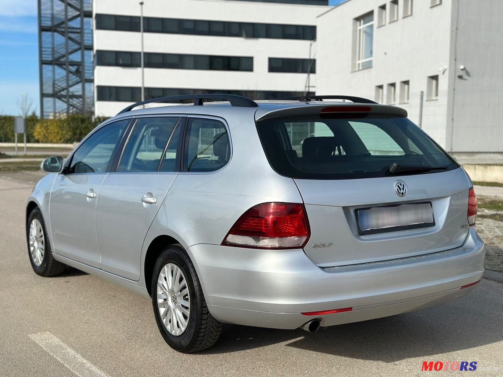 2011' Volkswagen Golf VI Variant photo #6