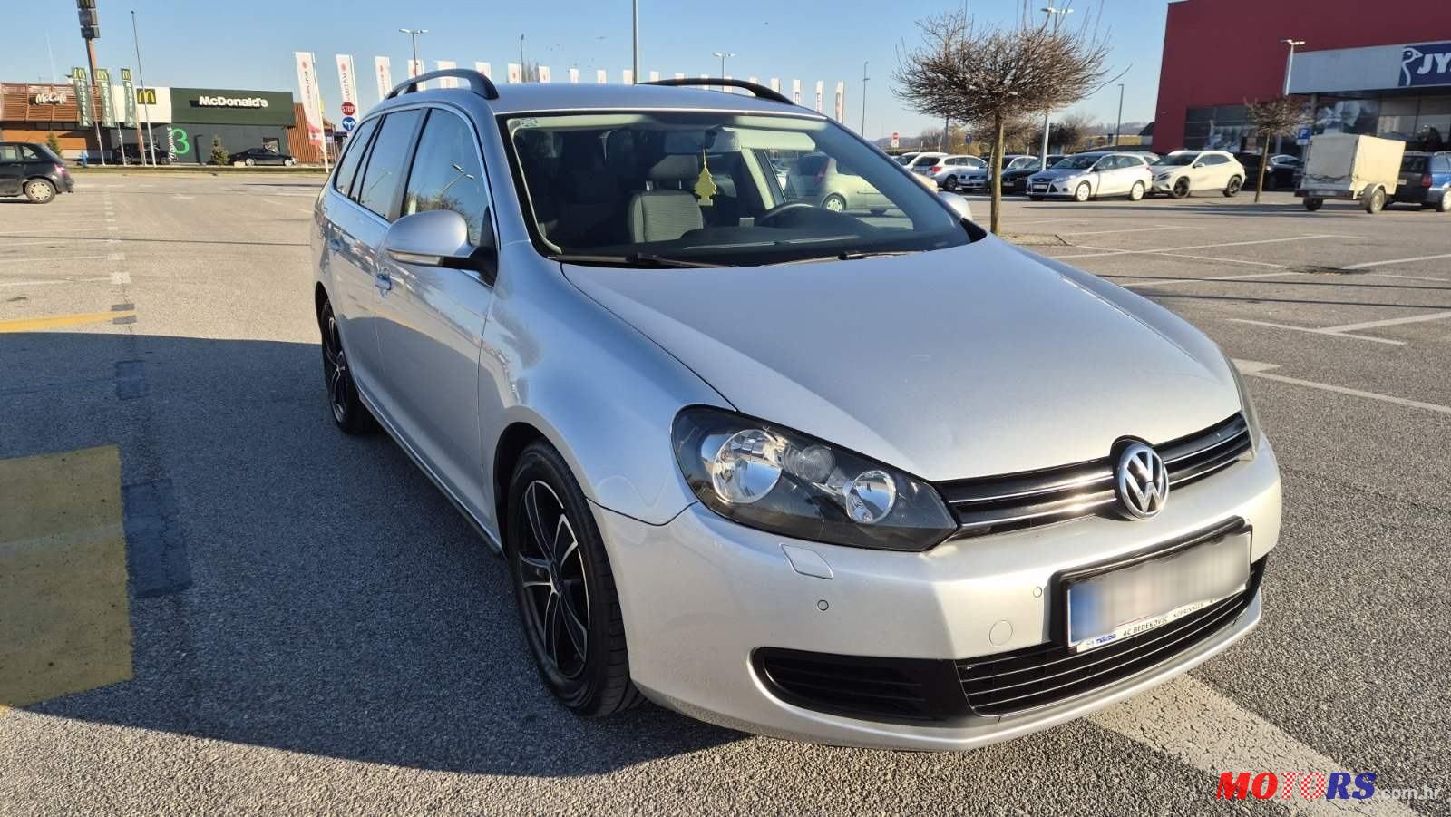 2011' Volkswagen Golf VI Variant photo #2