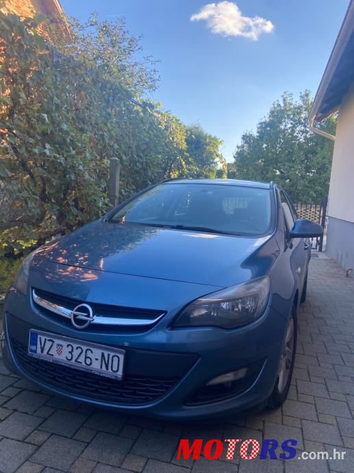 2014' Opel Astra Karavan photo #1