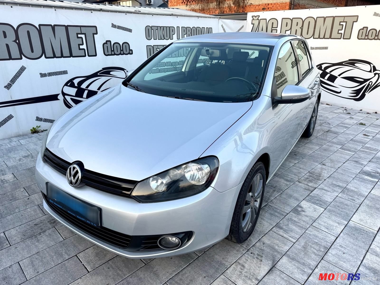 2012' Volkswagen Golf VI 1,6 Tdi photo #1