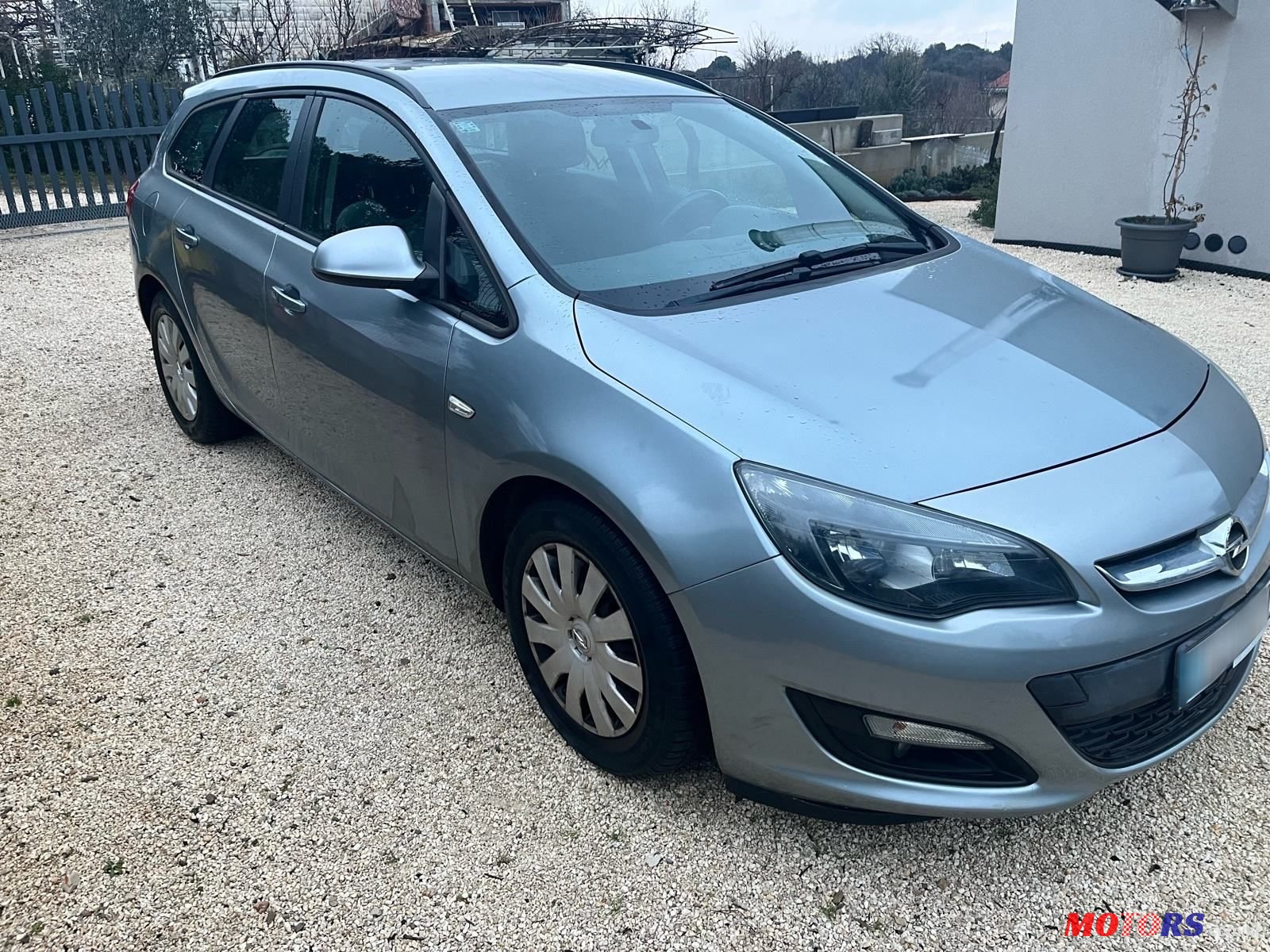 2014' Opel Astra Karavan photo #1