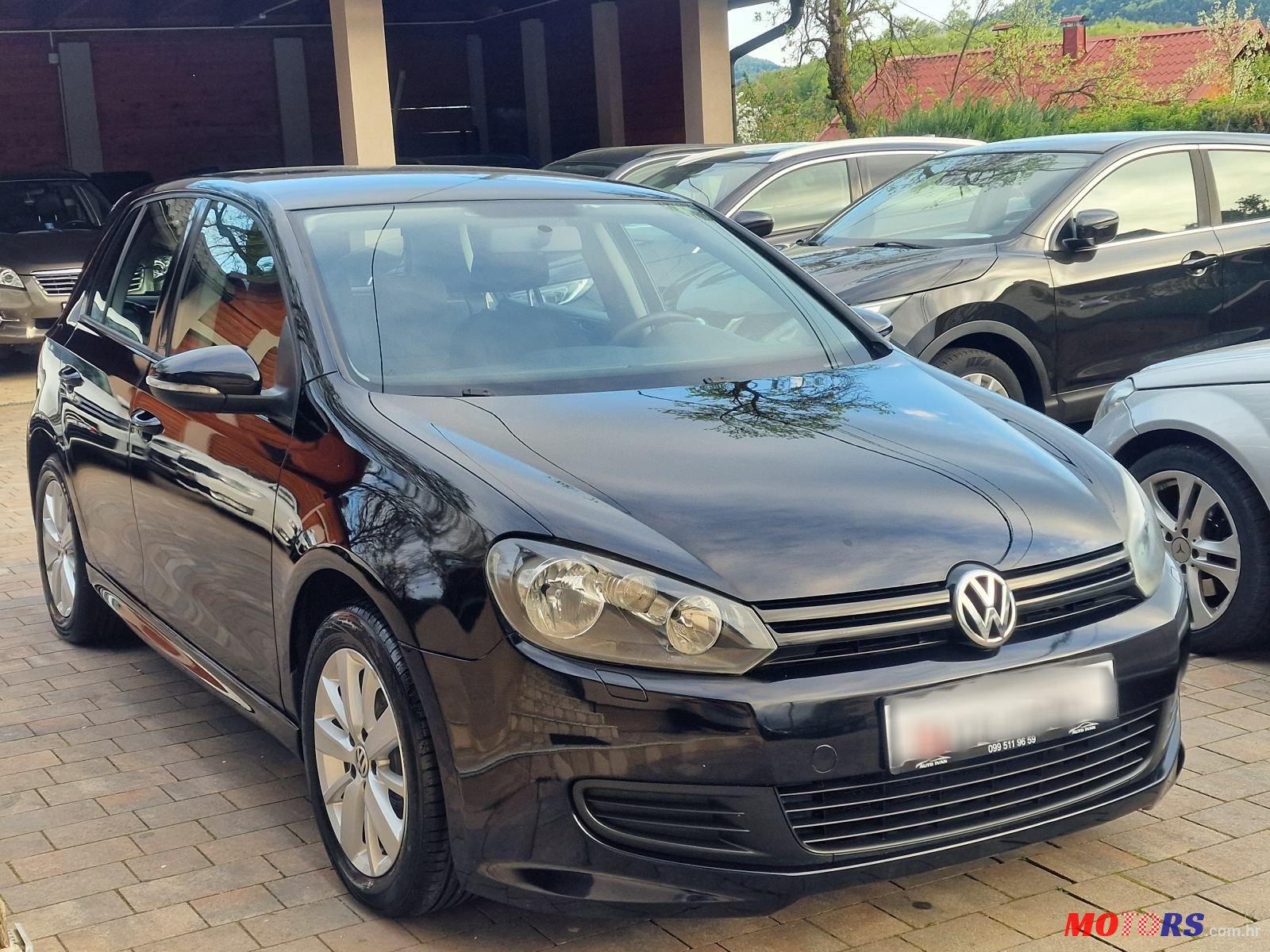 2011' Volkswagen Golf VI 1,6 Tdi photo #1