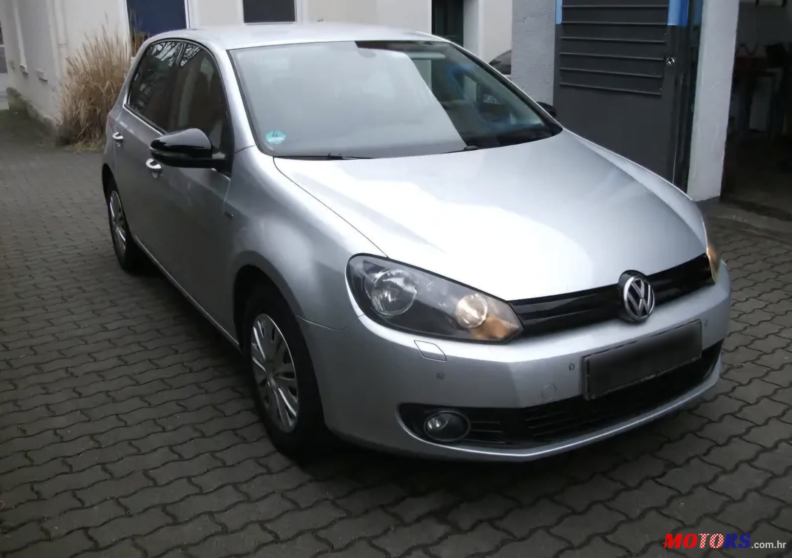 2012' Volkswagen Golf VI 1,6 Tdi photo #3