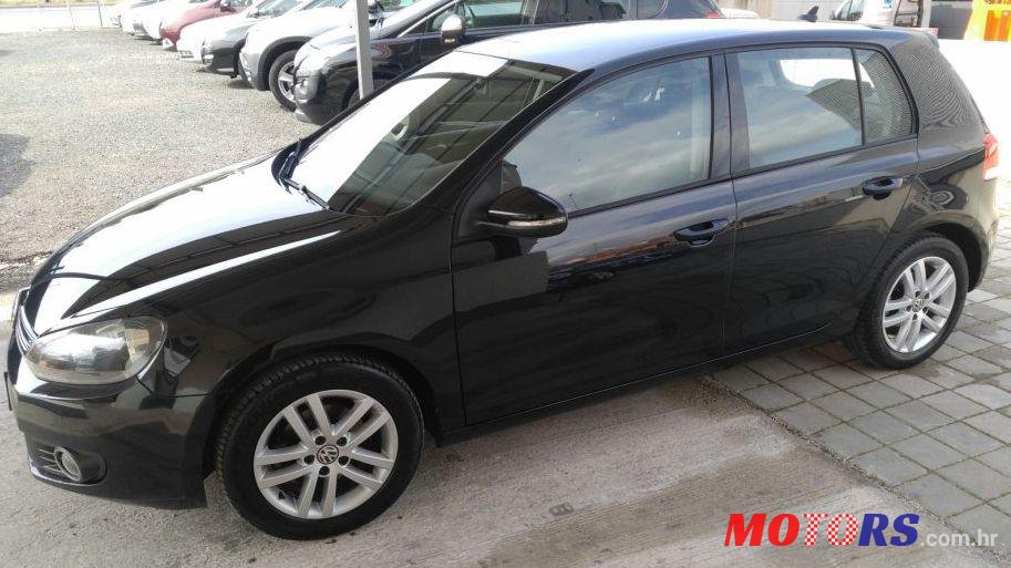 2012' Volkswagen Golf VI 1,6 Tdi photo #1