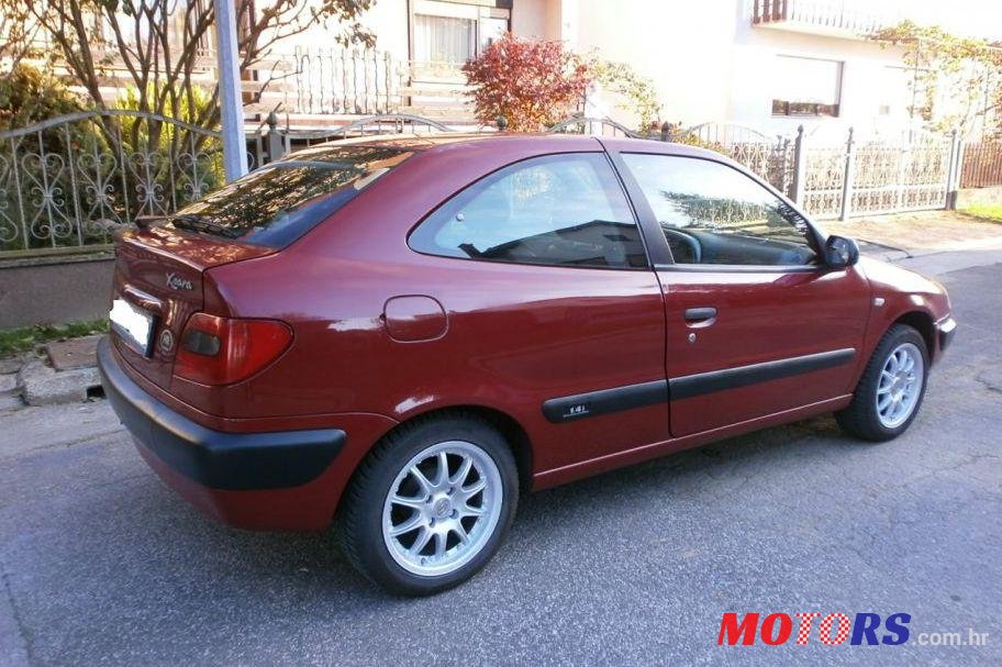 2000' Mazda 323 1.4I photo #1