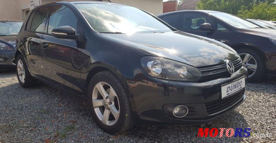 2012' Volkswagen Golf VI 1,6 Tdi photo #1