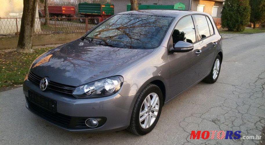 2011' Volkswagen Golf VI 1,6 TDI photo #1