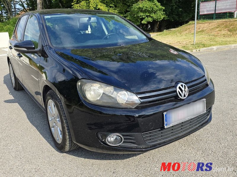2010' Volkswagen Golf VI 1,6 Tdi photo #1