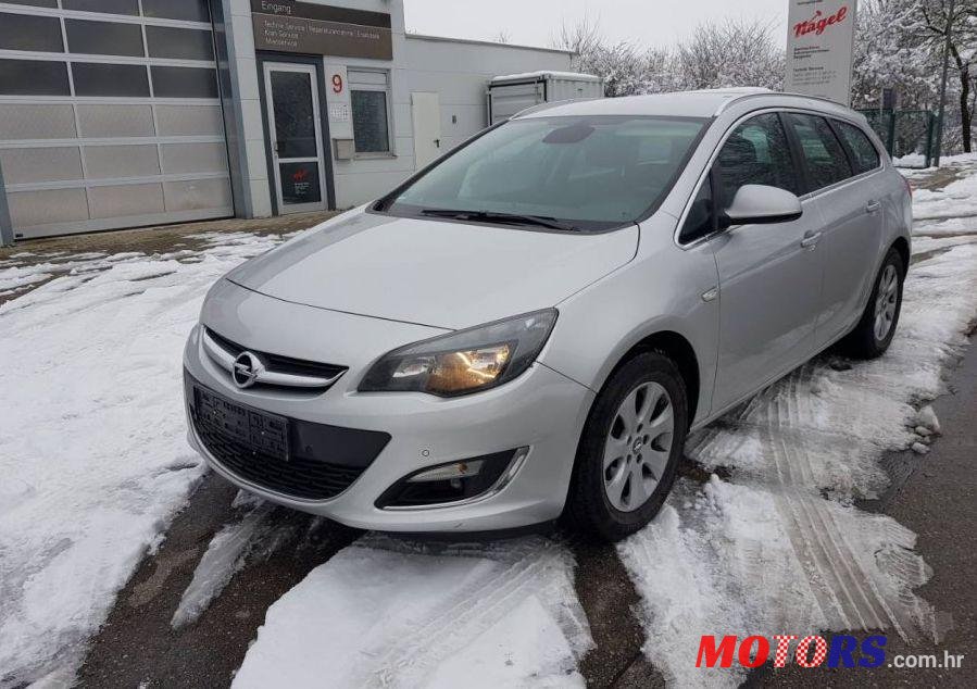 2014' Opel Astra Karavan photo #2