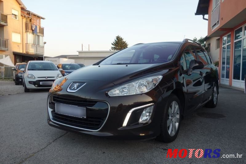 2012' Peugeot 308 Sw photo #3