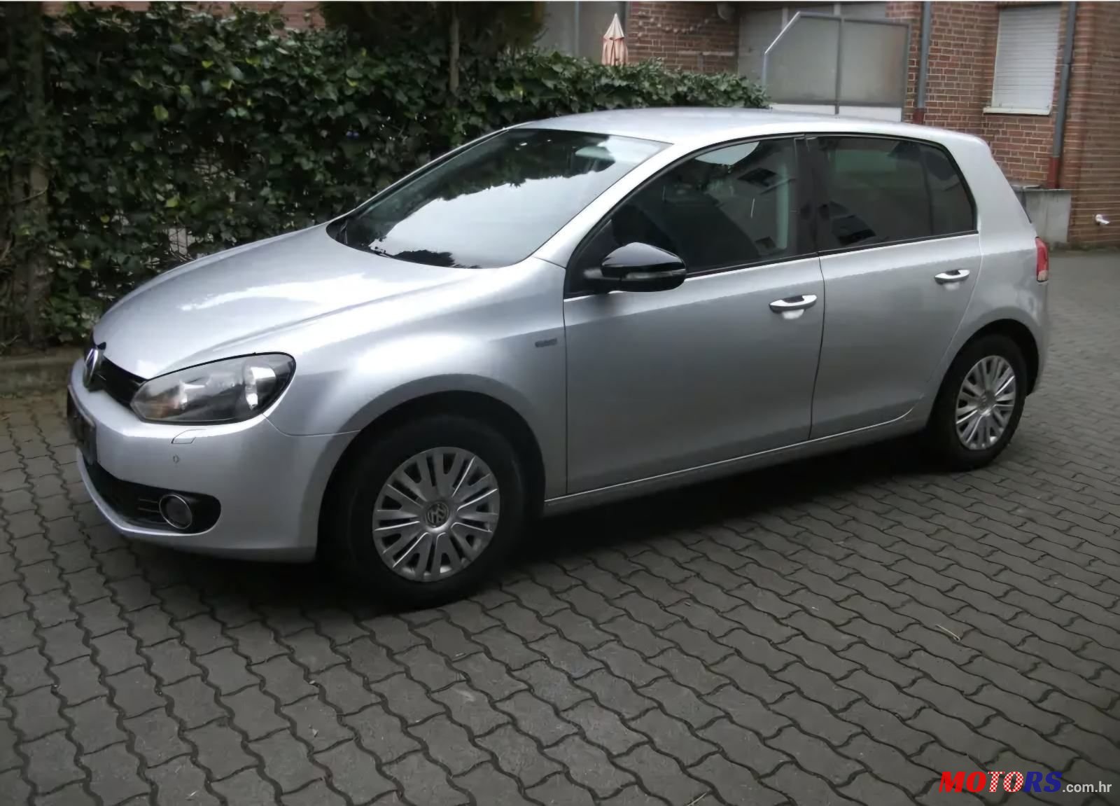 2012' Volkswagen Golf VI 1,6 Tdi photo #2