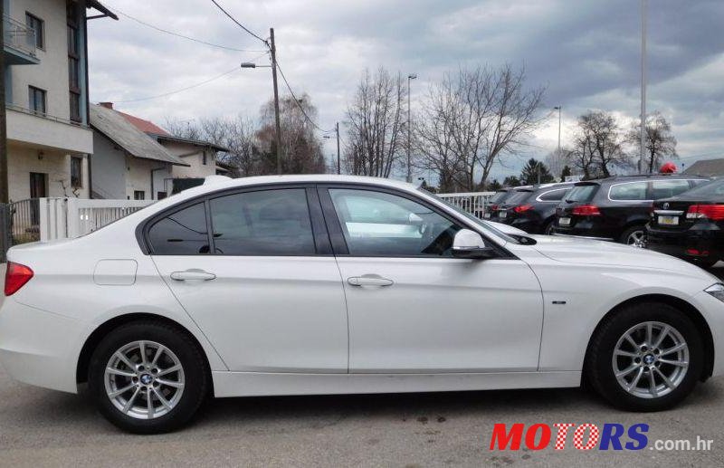 2014' BMW Serija 3 318D photo #2