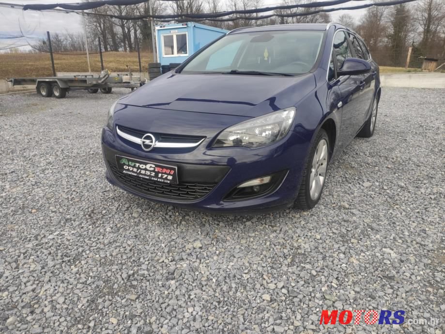 2015' Opel Astra Karavan photo #2