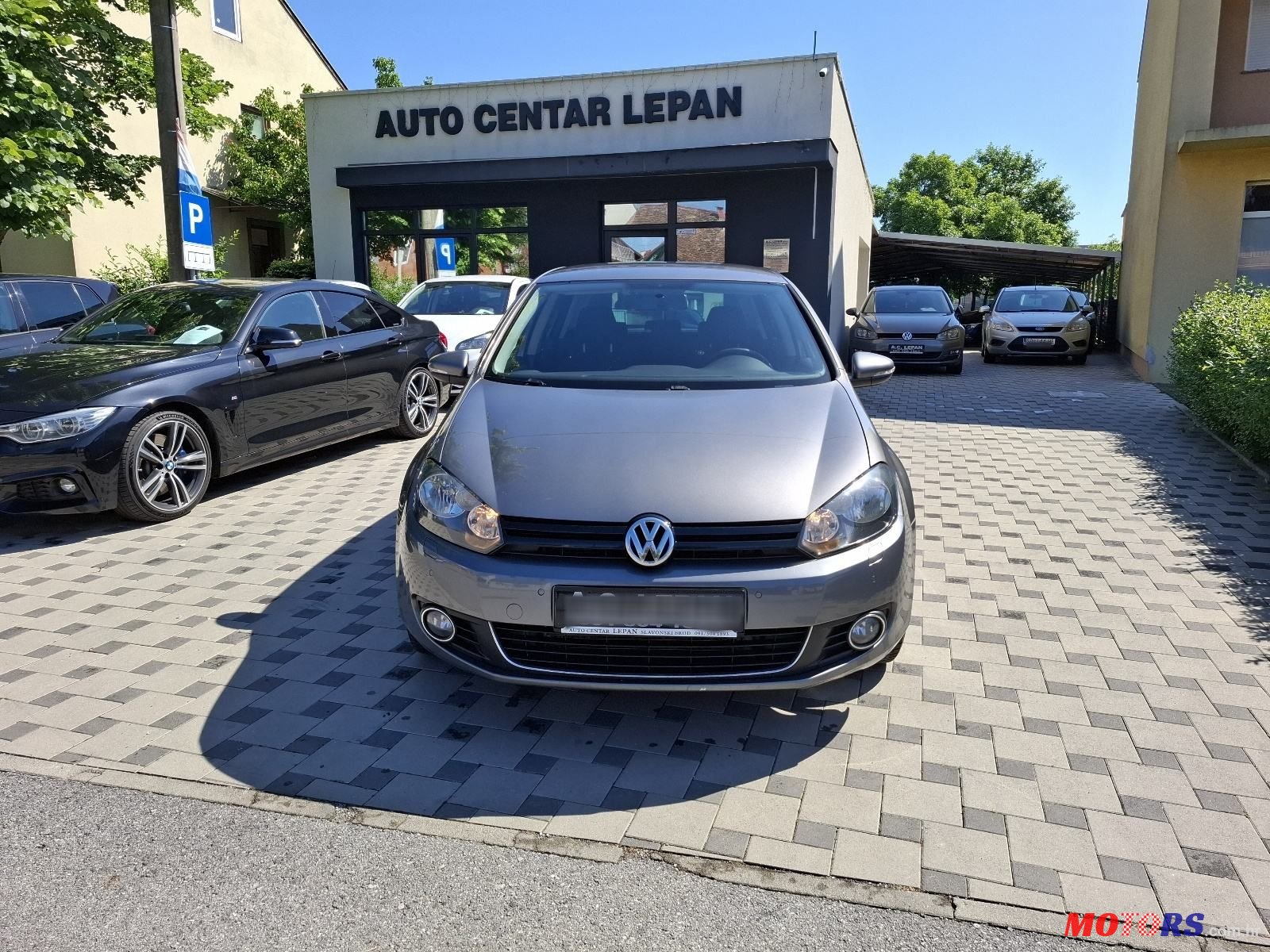 2010' Volkswagen Golf VI 1,6 Tdi photo #1