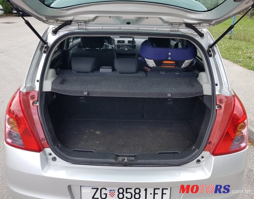 2009' Suzuki Swift 1,3 Glx photo #4