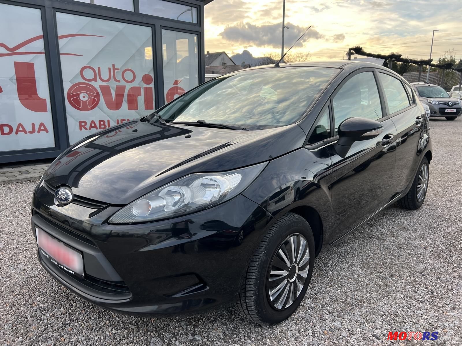 2012' Ford Fiesta 1,6 photo #1