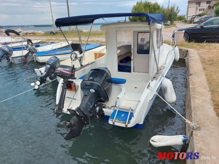 2004' Quicksilver 635 WEEKEND photo #1