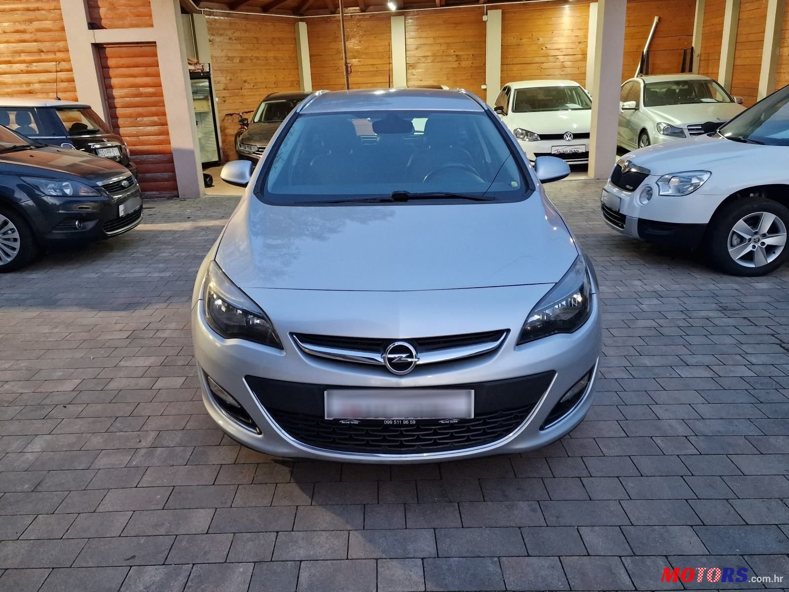 2014' Opel Astra Karavan photo #3