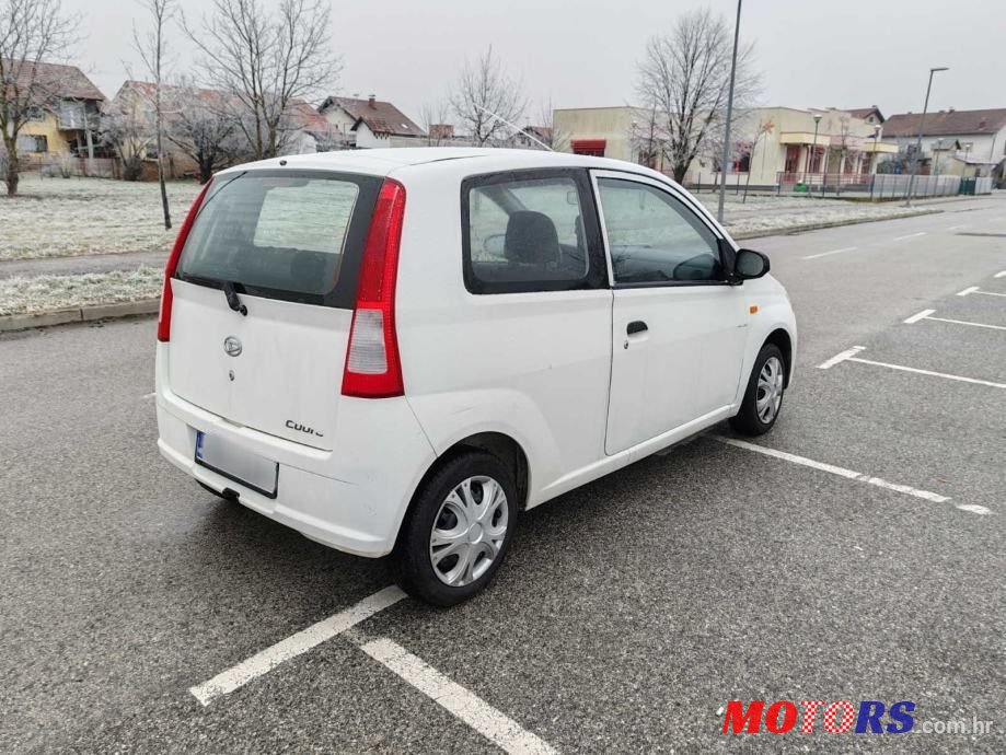 2004' Daihatsu Cuore Pur photo #4